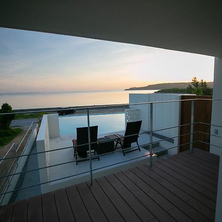 Keiki Beachhouse & Cafe Hotell Nakijin Eksteriør bilde
