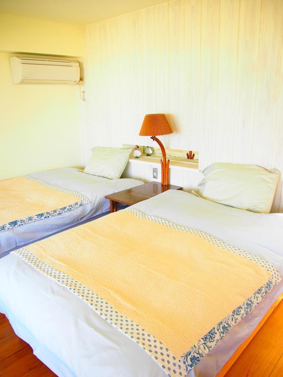Keiki Beachhouse & Cafe Hotell Nakijin Eksteriør bilde