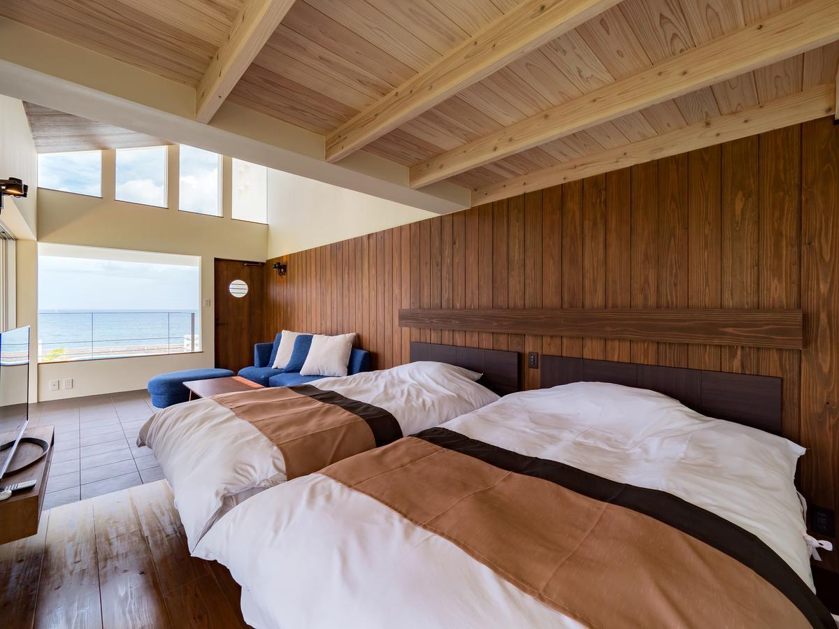 Keiki Beachhouse & Cafe Hotell Nakijin Eksteriør bilde