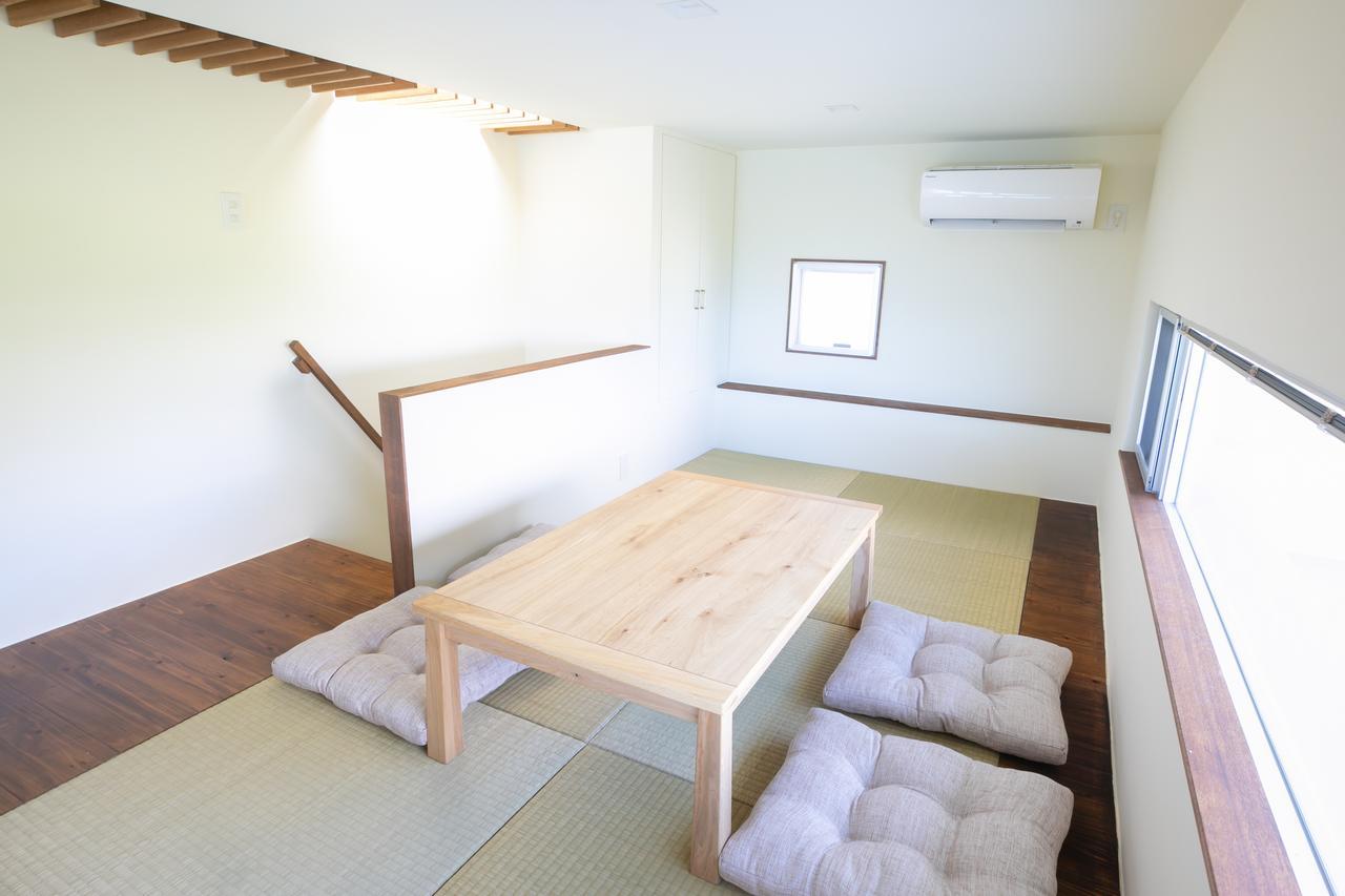Keiki Beachhouse & Cafe Hotell Nakijin Eksteriør bilde